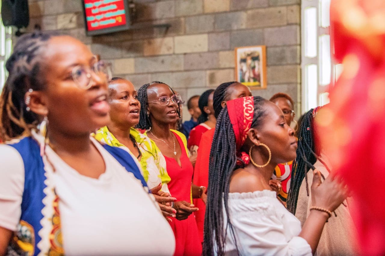Choristers singing during Sunday Mass at St. Paul's University Chapel