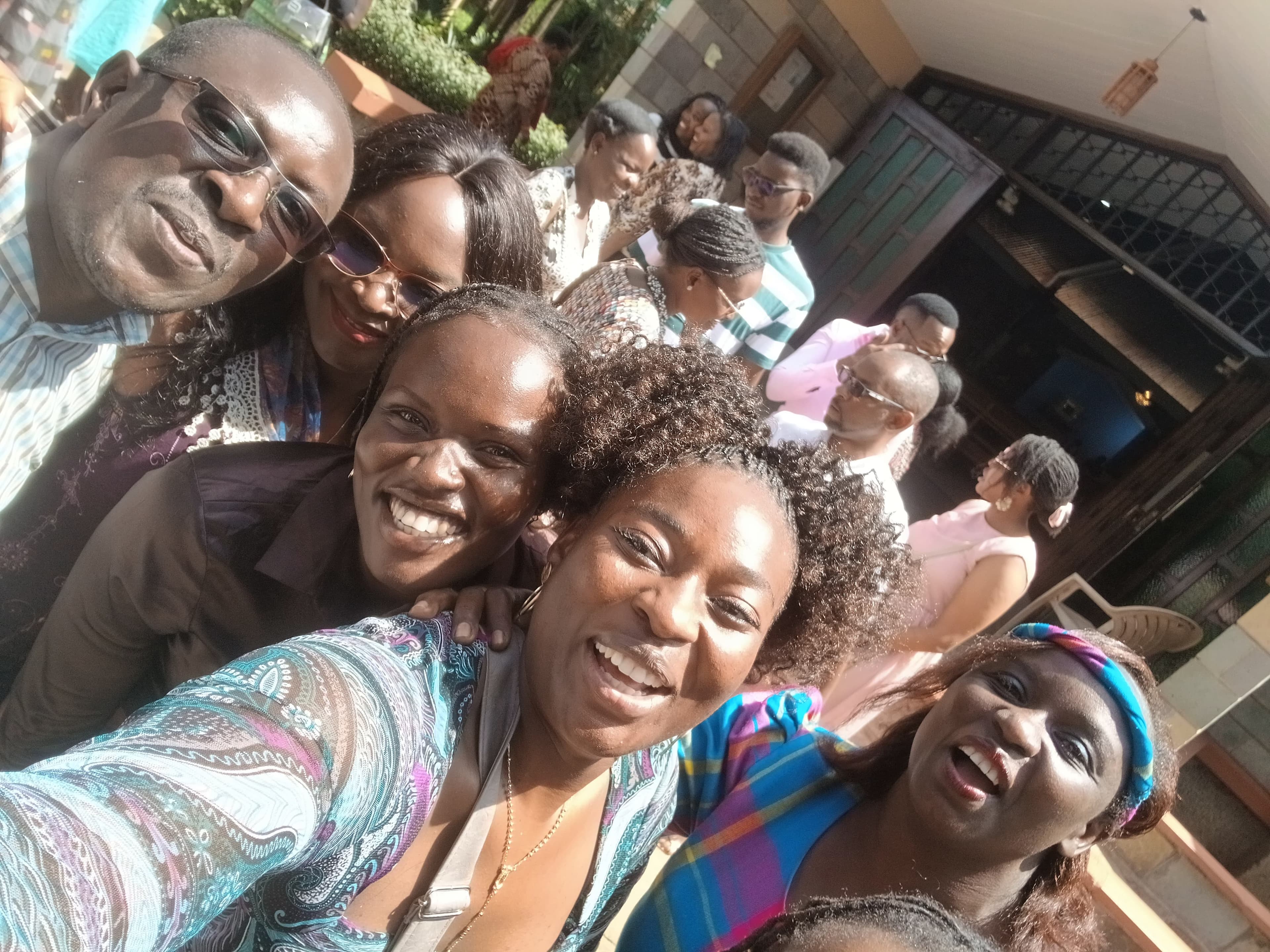 Choir members gathered outside St. Paul's University Chapel after Sunday Mass